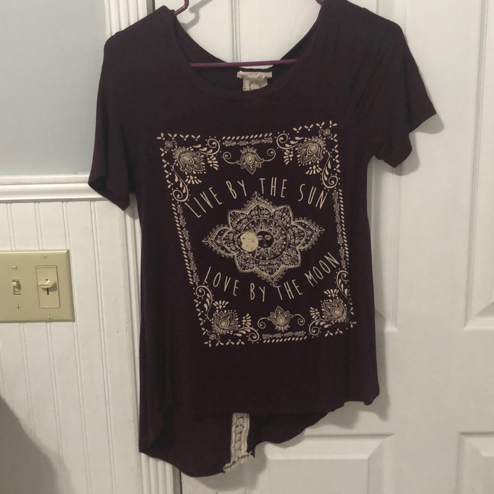 A burgundy/maroon shirt. never worn.